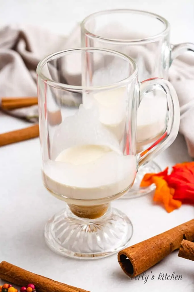 Heavy cream and brown sugar in a mug.