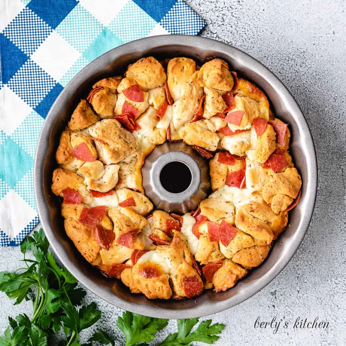 The pizza monkey bread in a bundt pan.