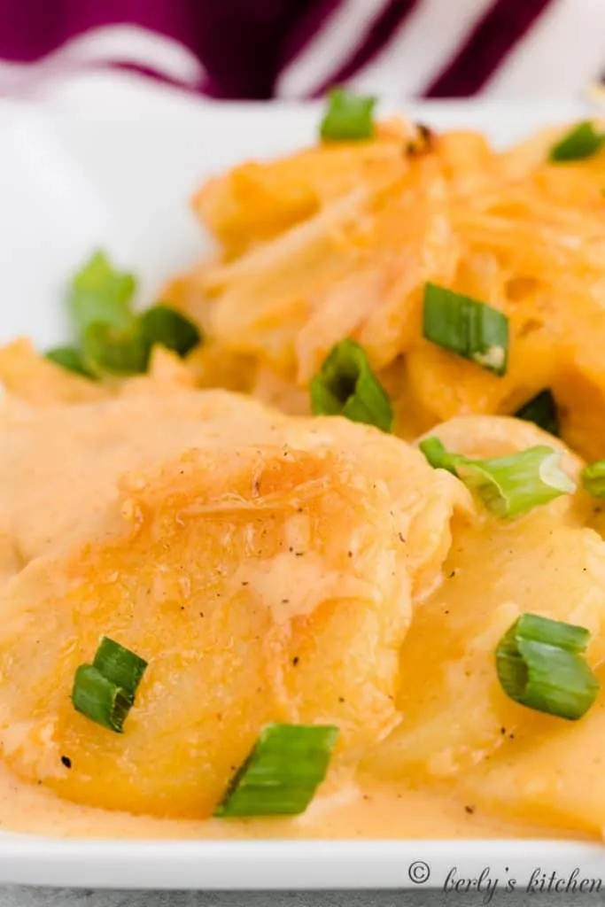 A close-up photo of the creamy scalloped potatoes.