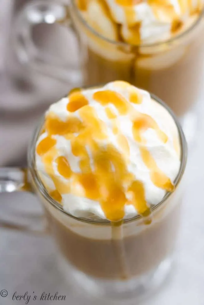 An aerial view of the garnished coffee in a mug.