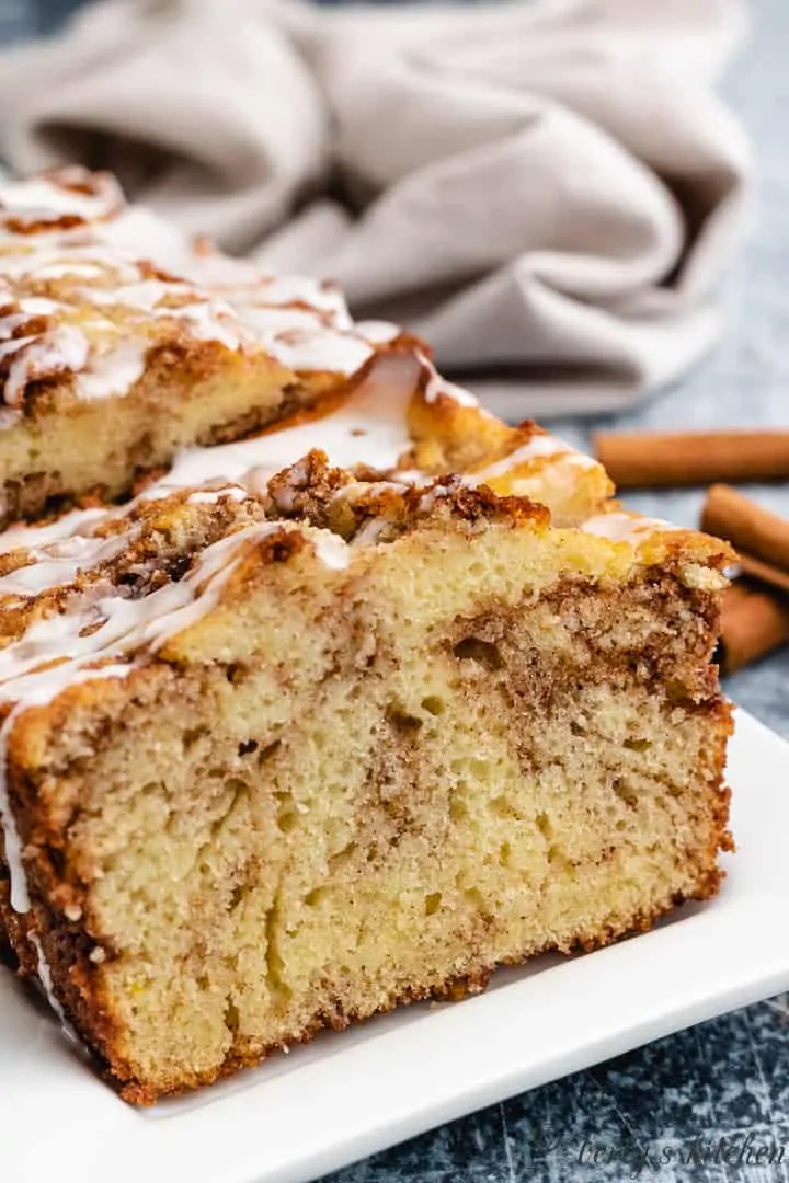 The glaze drizzled over the cooled bread.