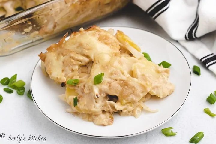 A scoop of the french onion potato bake on a plate.