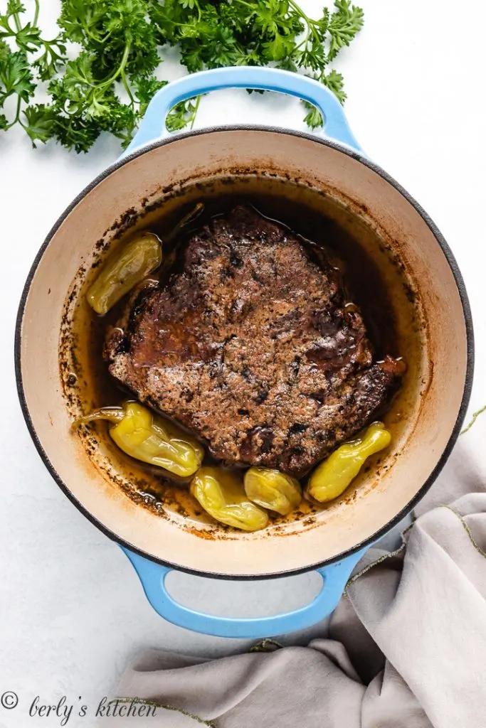 Cooked mississippi pot roast in a dutch oven.