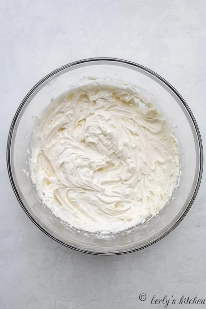 The mixed peppermint frosting in a mixing bowl.