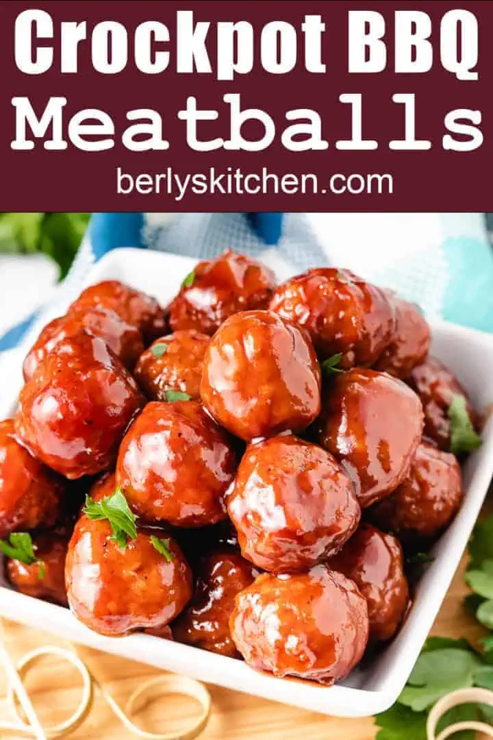 Several meatballs in a square dish.