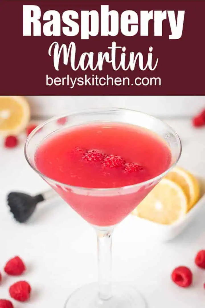 Raspberry martini cocktail garnished with fresh raspberries.