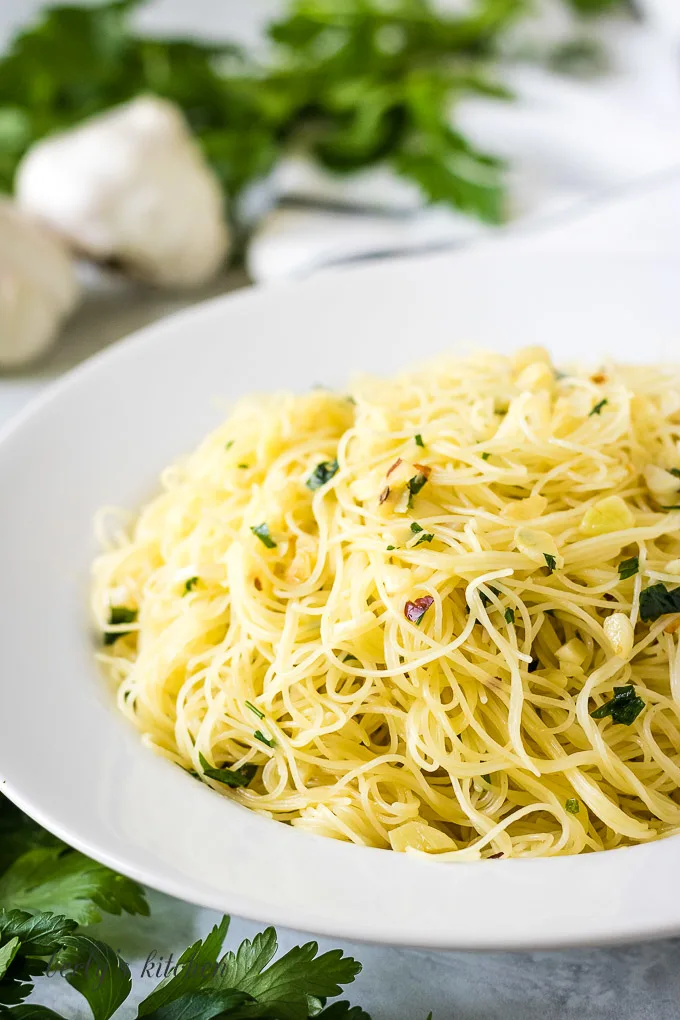 Angel hair pasta with red pepper flakes and parsely.