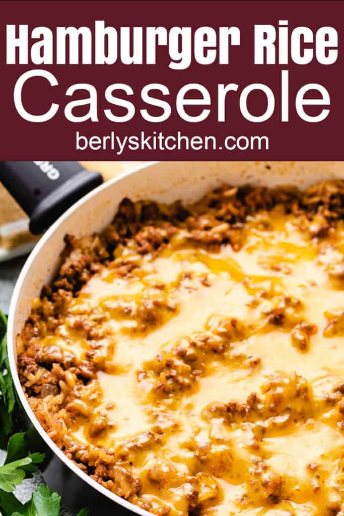 Pan of ground beef and rice casserole with cheddar cheese.