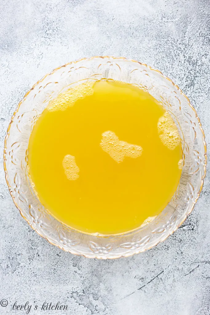 Top down view of water, pineapple juice, and lemonade.