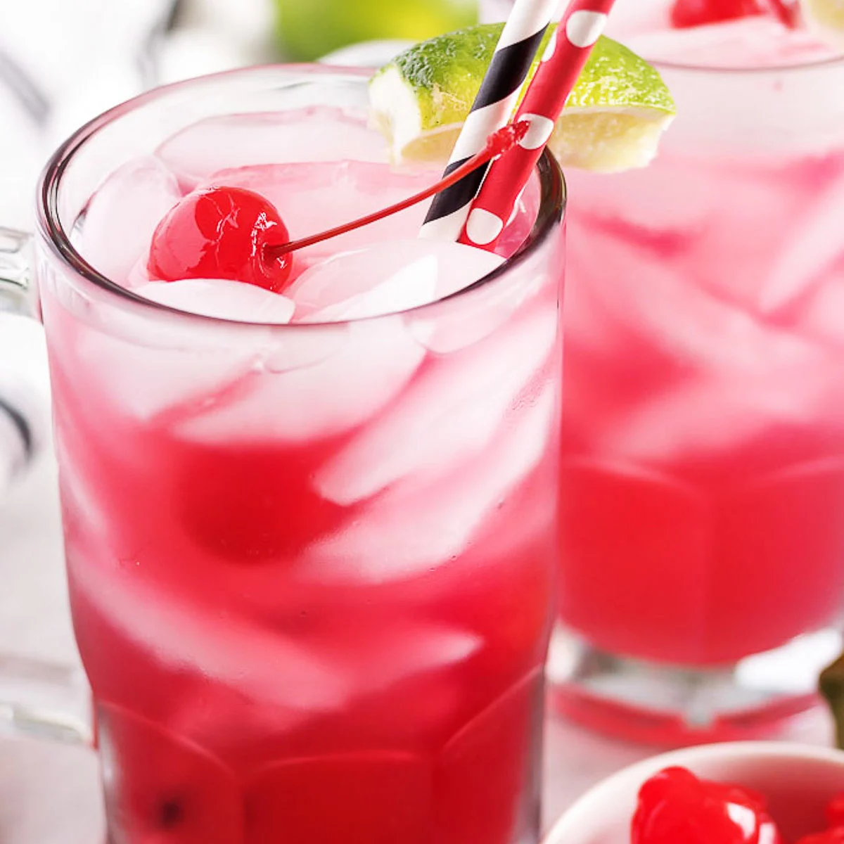 Cherry limeade topped with a cherry.