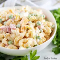 White bowl filled with macaroni salad.