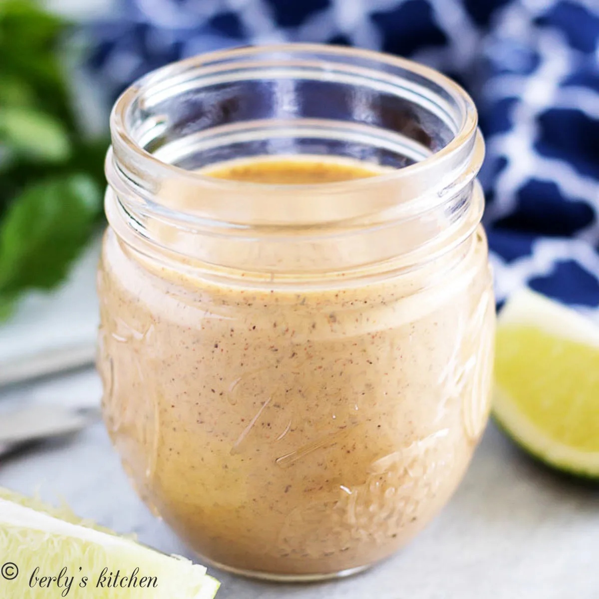 Close up view of southwest dressing in a glass jar.