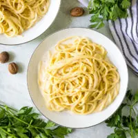 Top down view of pasta with noodles with bechamel sauce and nutmeg.