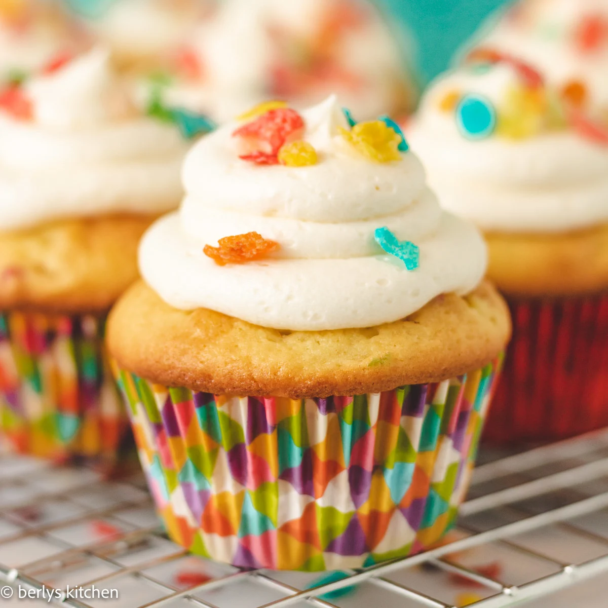 Close up of a fruity pebbles cupcakes.