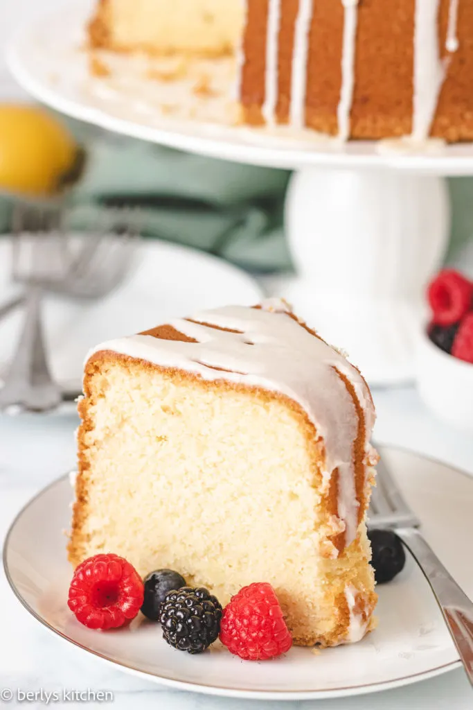 Lemon pound cake and berries on a plate.