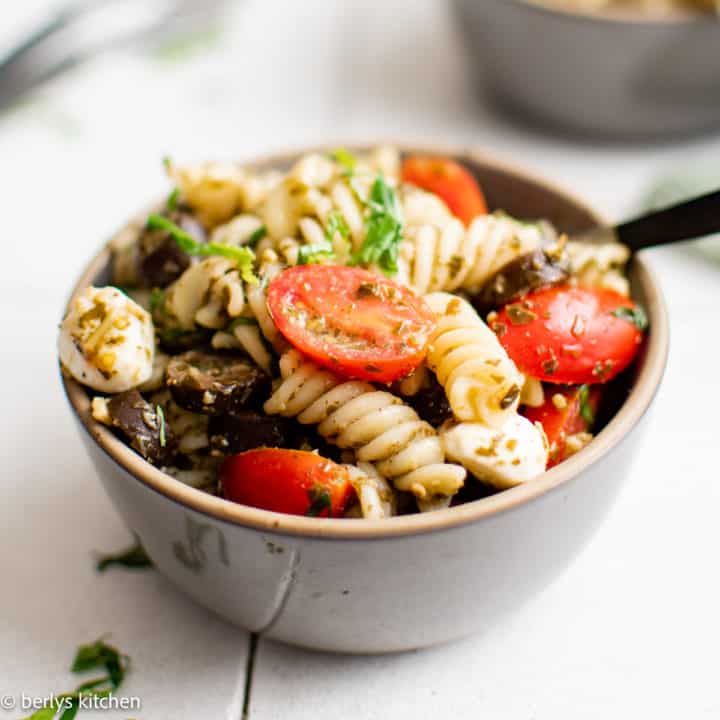 Gray bowl filled with pasta salad.