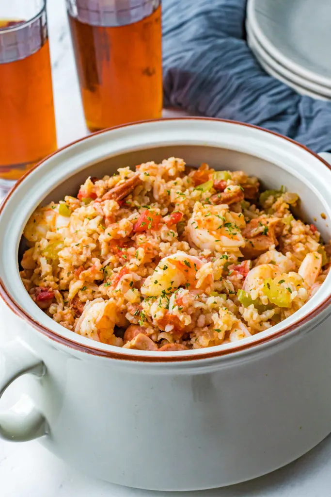 Gray bowl with shrimp and sausage jambalaya.