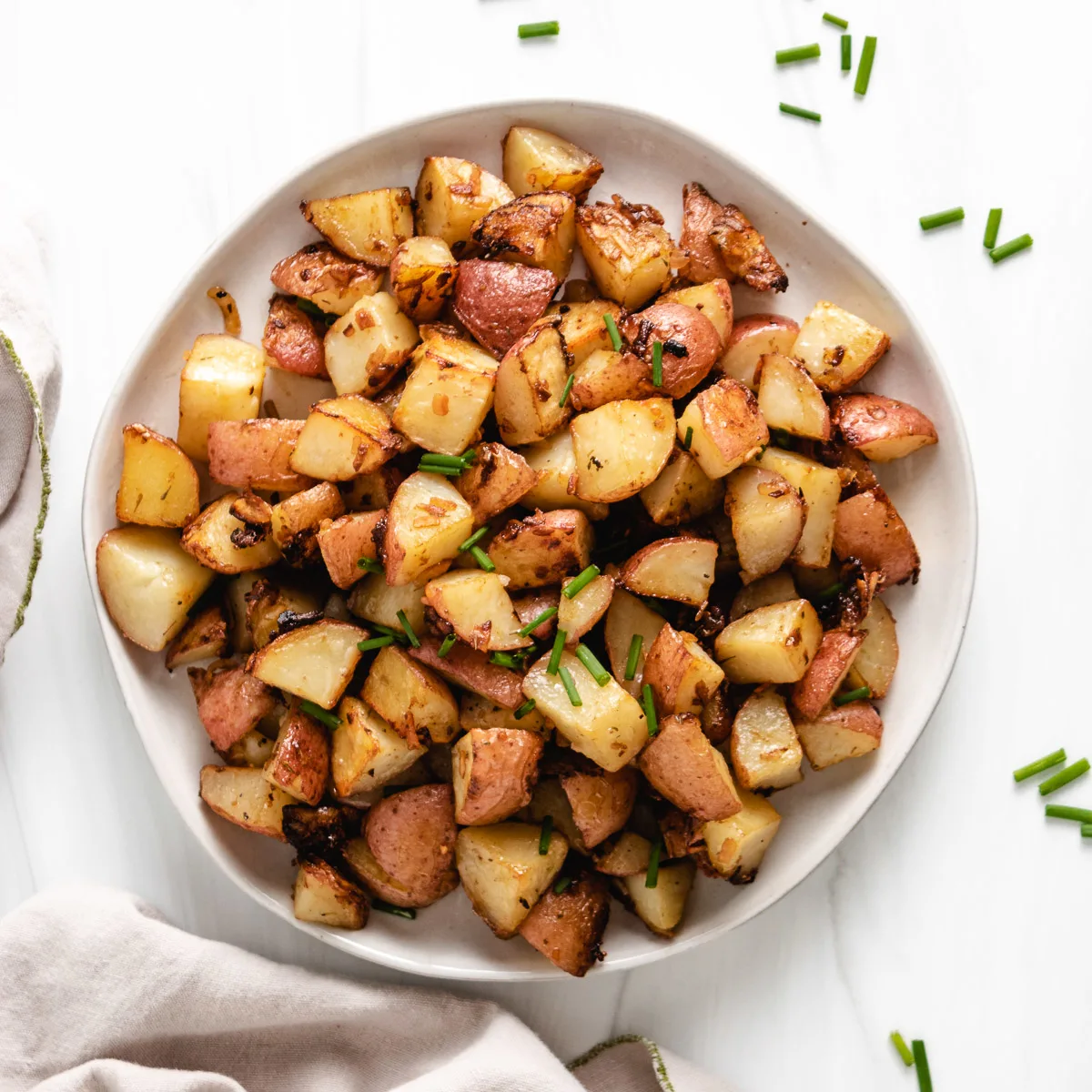 Top down view of diced red potatoes.