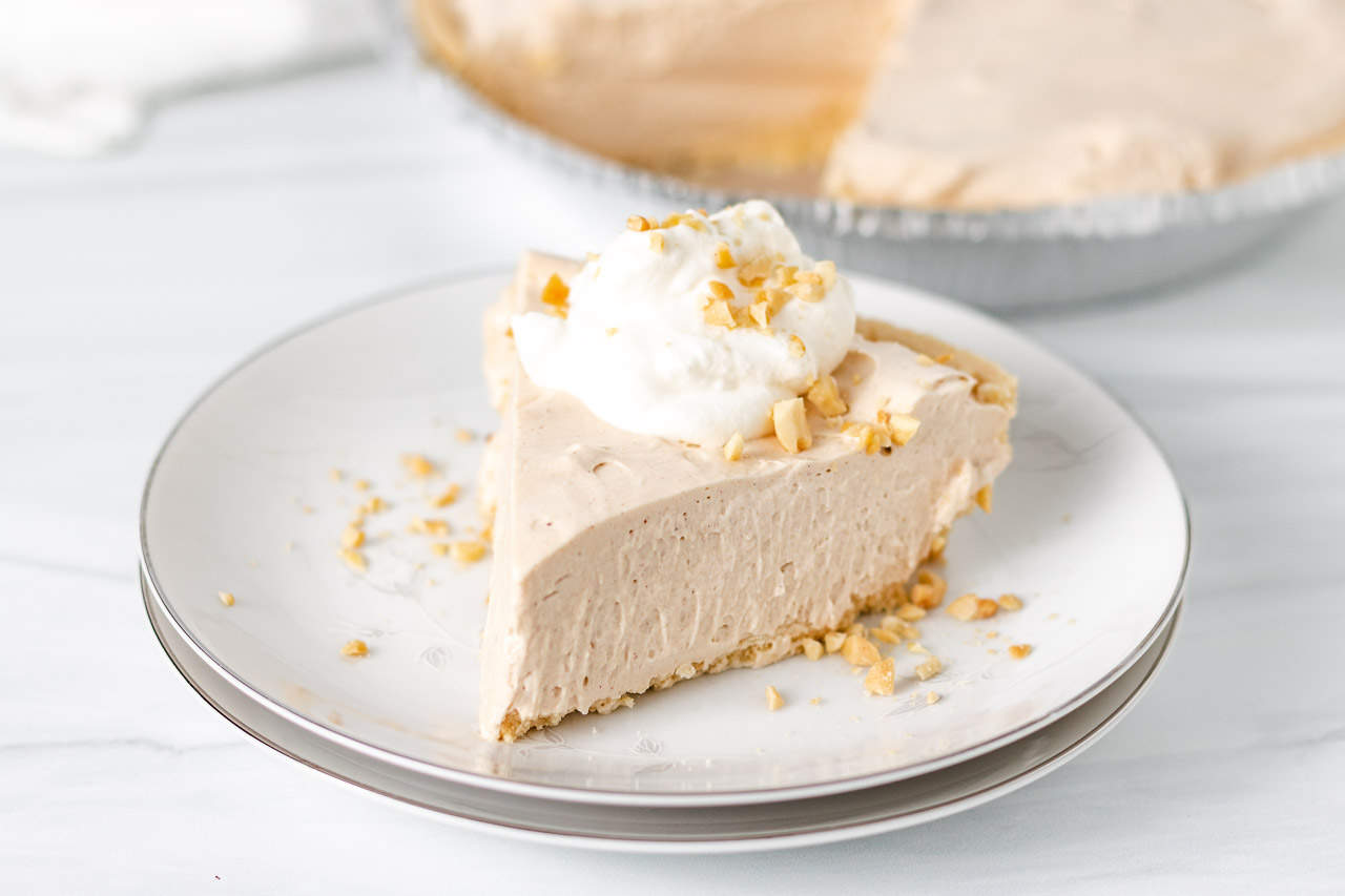 Frozen pie on a white plate.