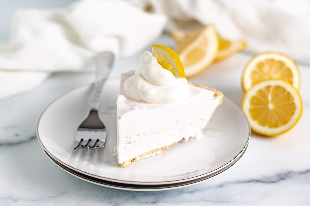 Slice of frozen pie on a plate.