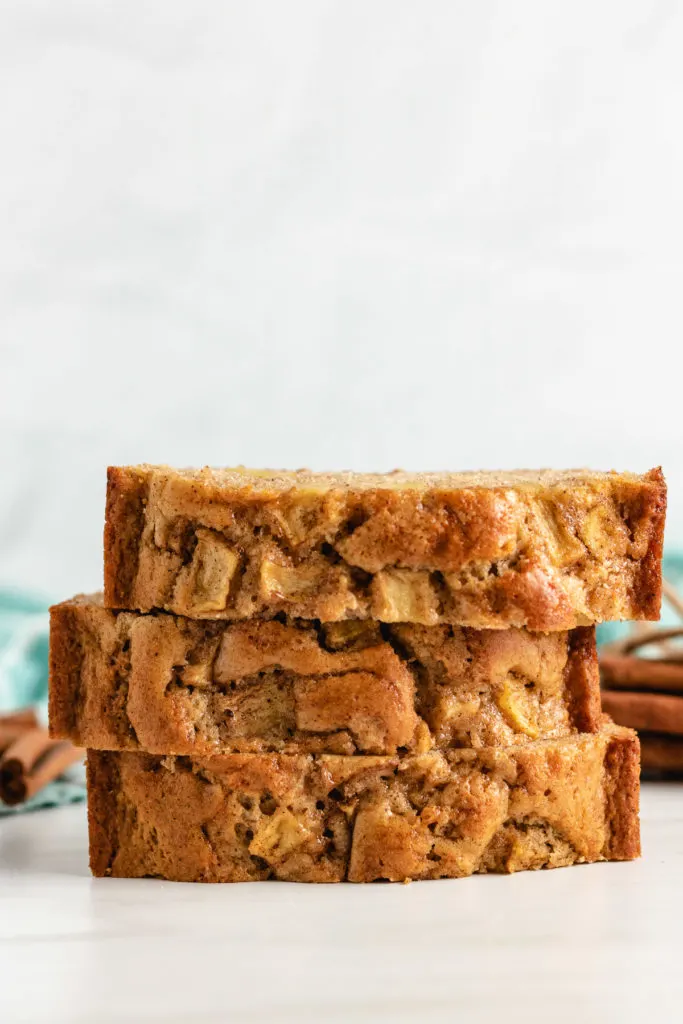 Three slices of apple cinnamon bread stacked.