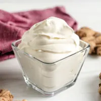 Ginger infused whipped cream in a serving dish.