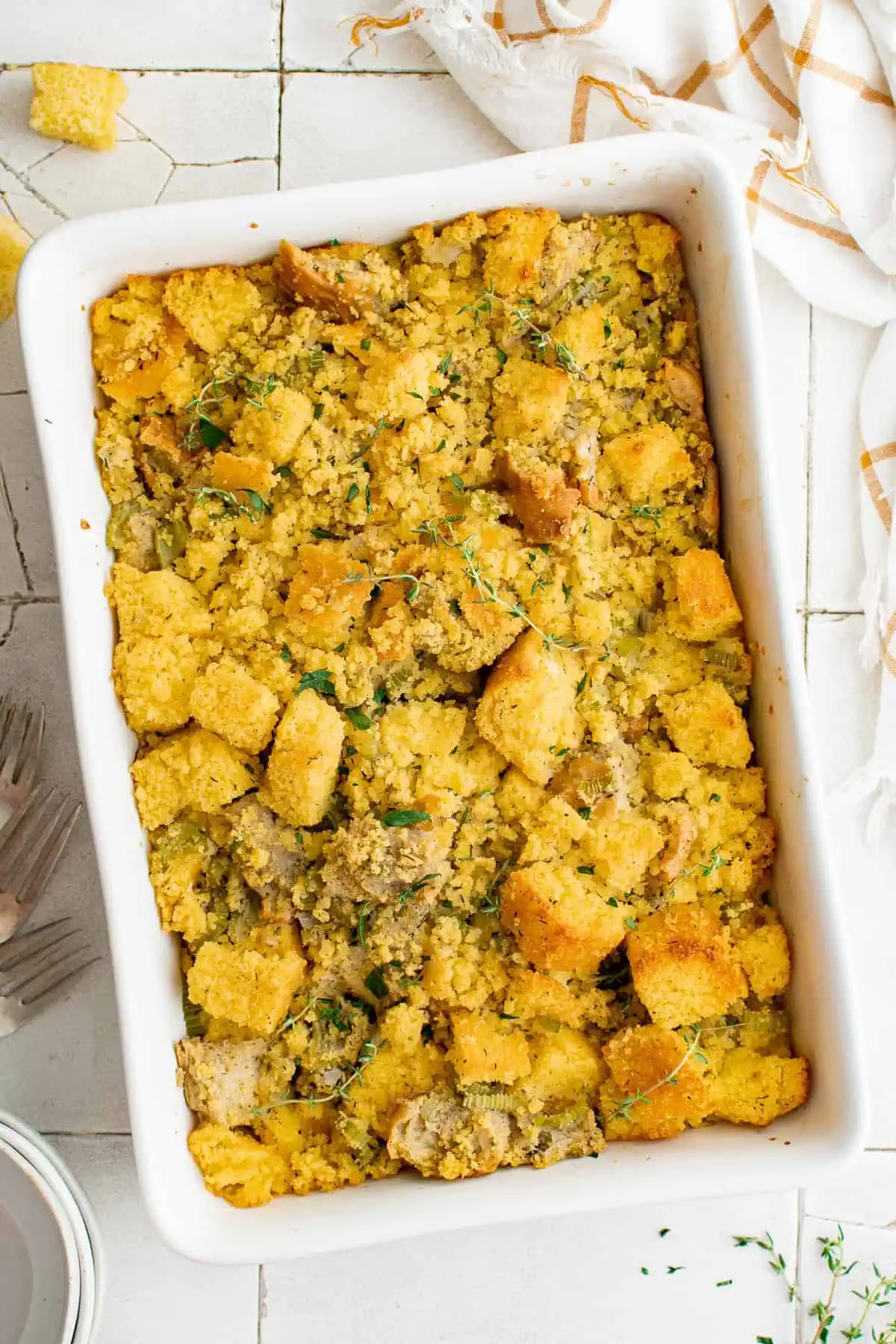 Top down view of cornbread stuffing in a casserole dish.