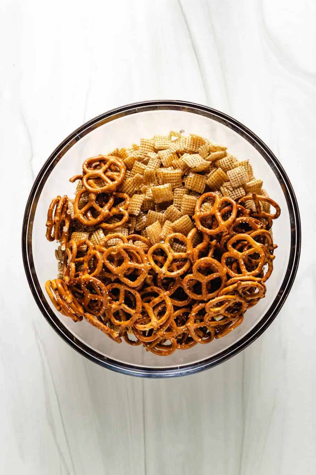 Top down view of brown sugar butter mixture poured over cereal.