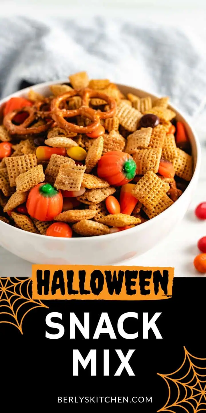 Large bowl filled with halloween snack mix.