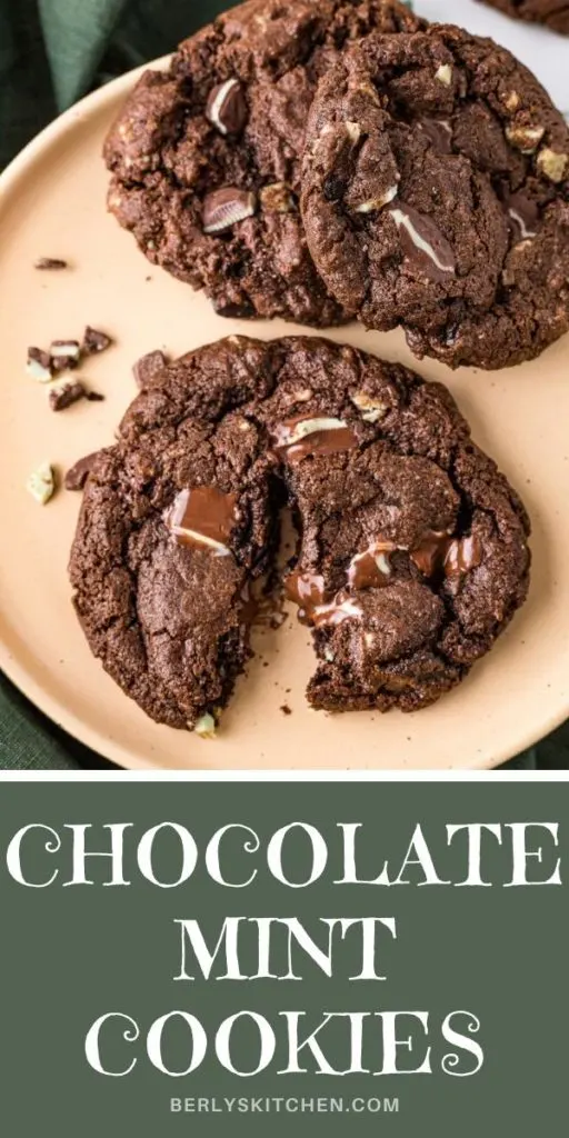 Chocolate cookie halved on a brown plate.