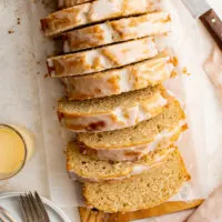 Top down view of sliced eggnog bread on a platter.