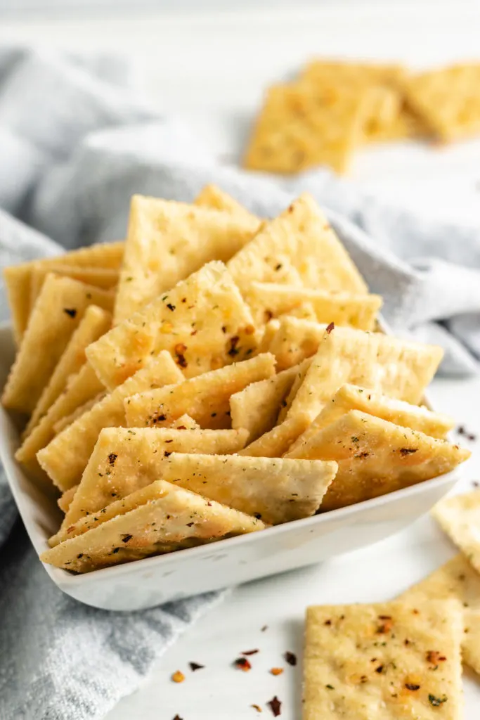 Several firecracker crackers stuffed in a bowl.