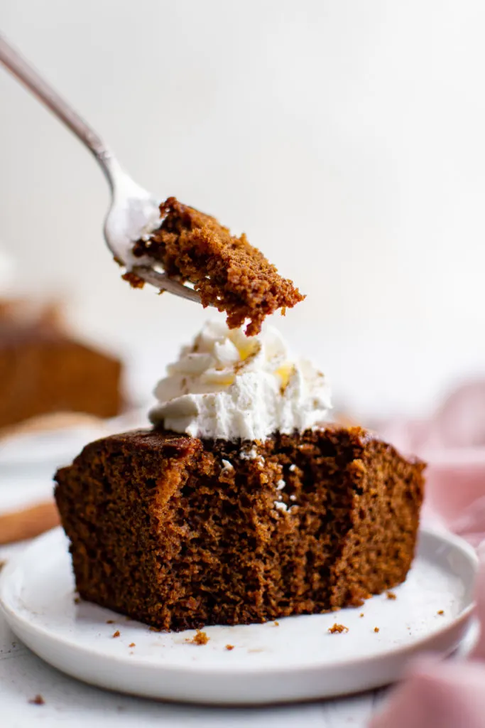 Gingerbread cake on a fork.