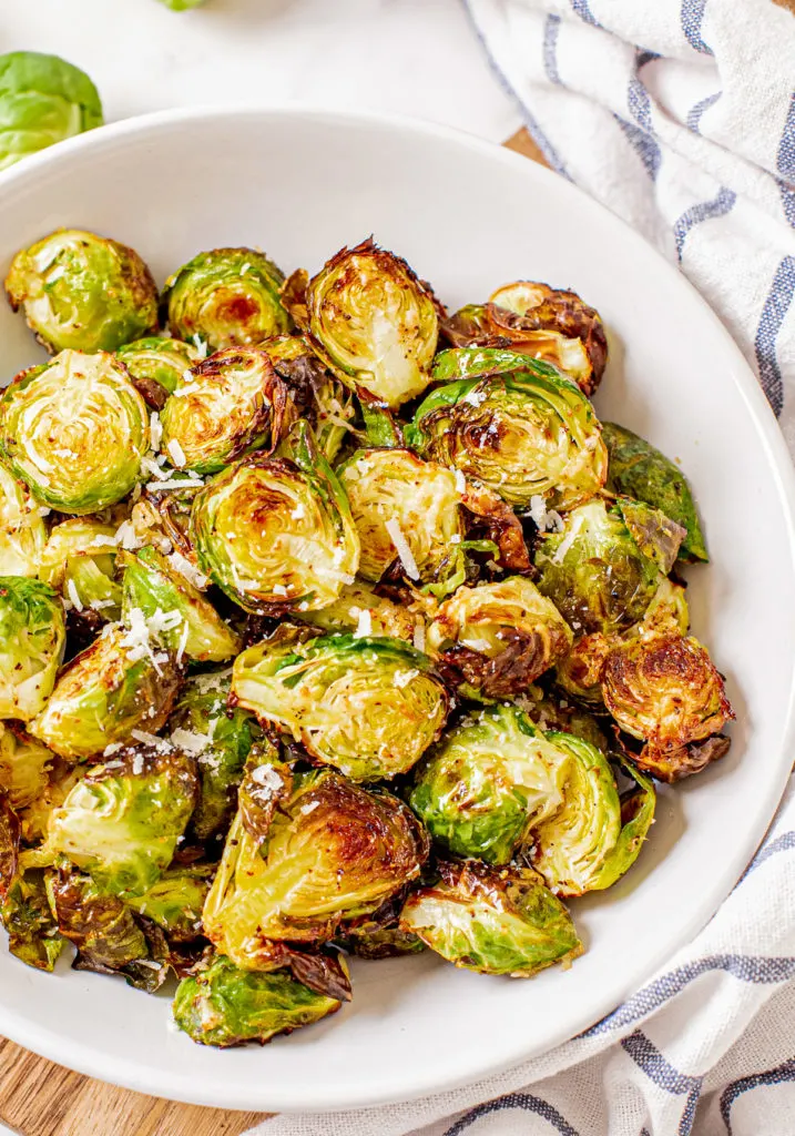 Close up view of brussel sprouts in a bowl.