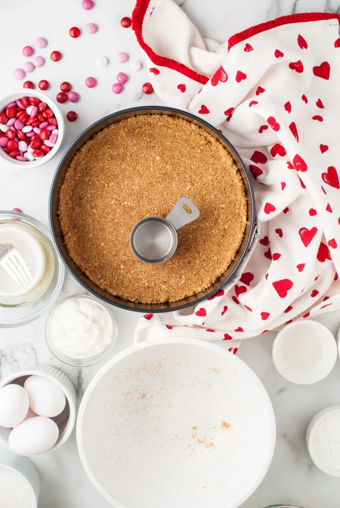 Graham cracker crust in springform pan.