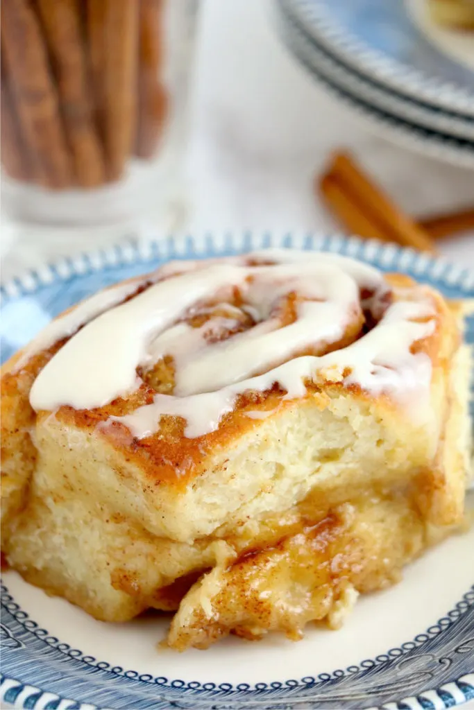 Close up view of an air fryer cinnamon roll.