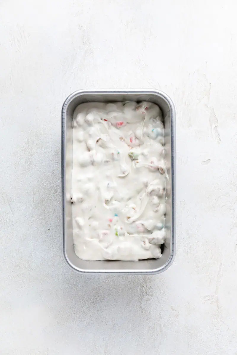 Lucky charms ice cream in a loaf pan.