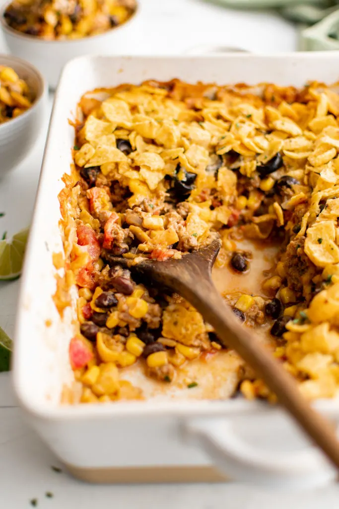 Spoon in a pan of taco casserole.