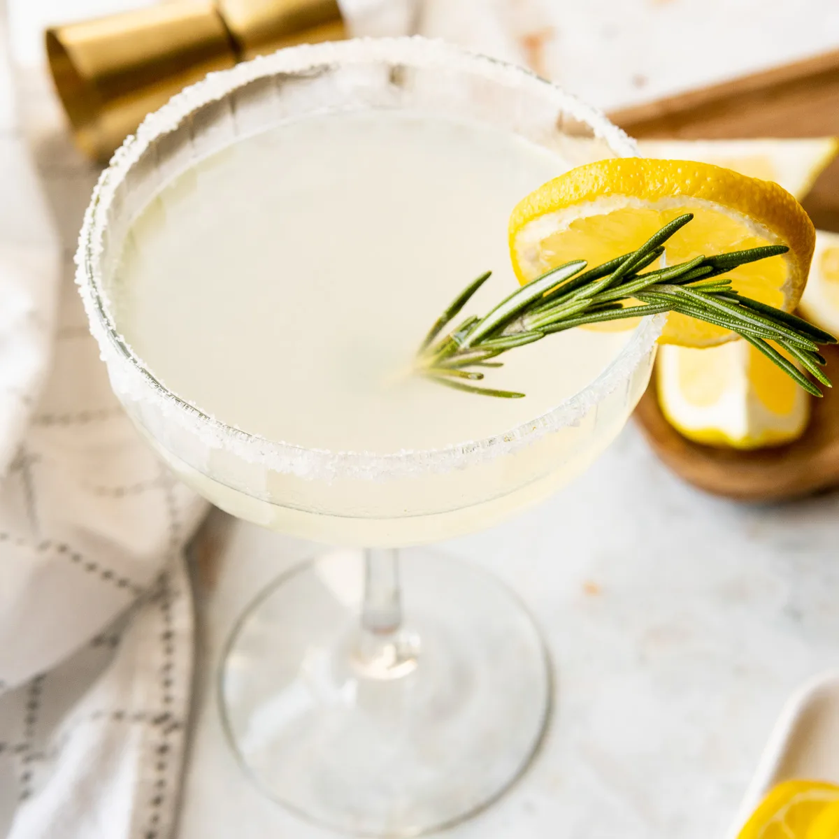 Lemon margarita with rosemary.