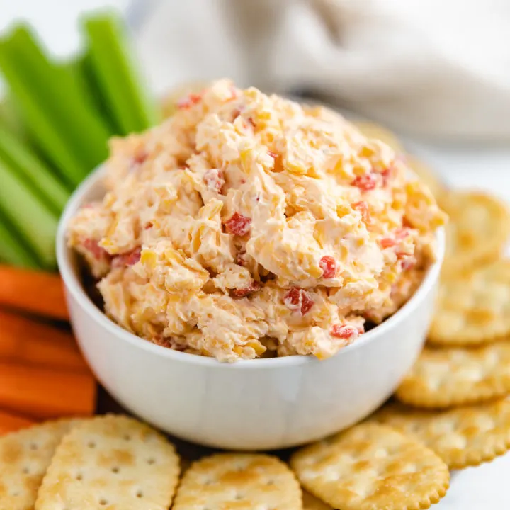 Pimento dip in a white bowl.