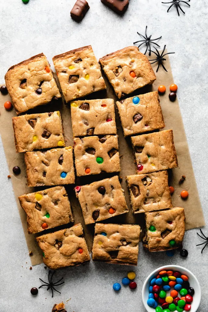 Top down view of a batch of cookie bars cut into individual servings.