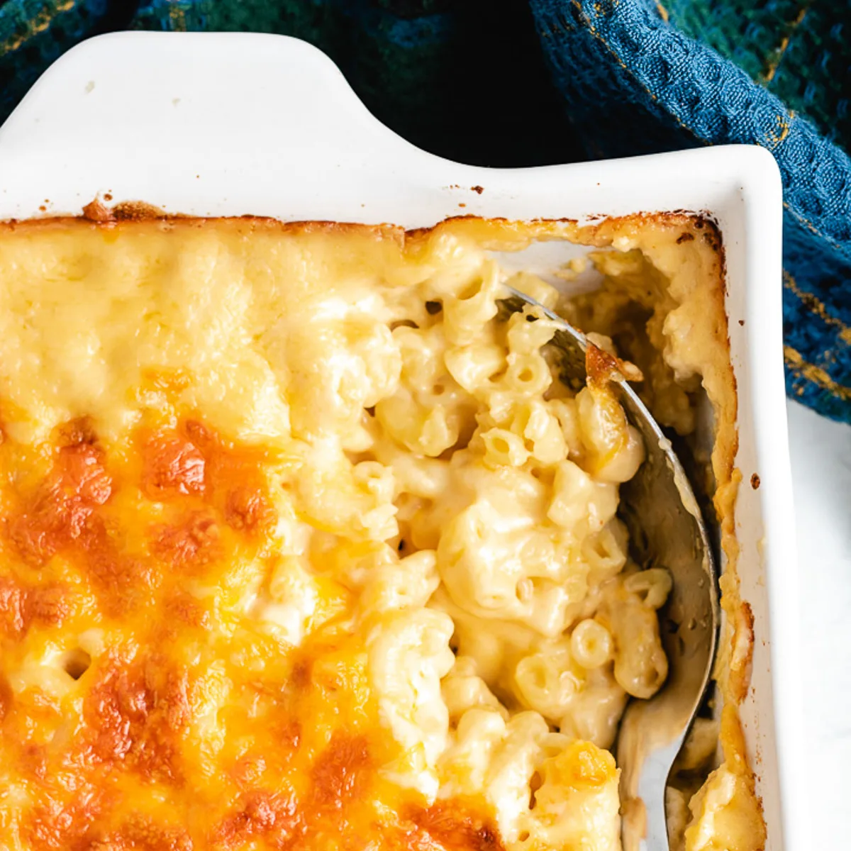 Close up view of a pan of 3 cheese mac and cheese.