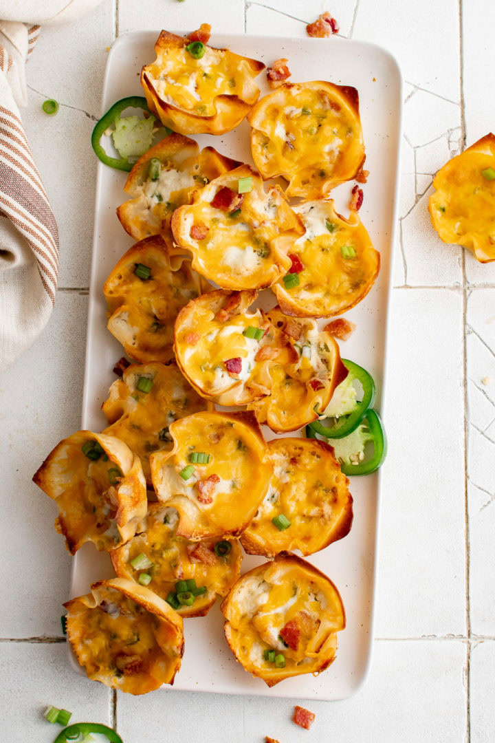 Top down view of a platter of jalapeno popper appetizers.