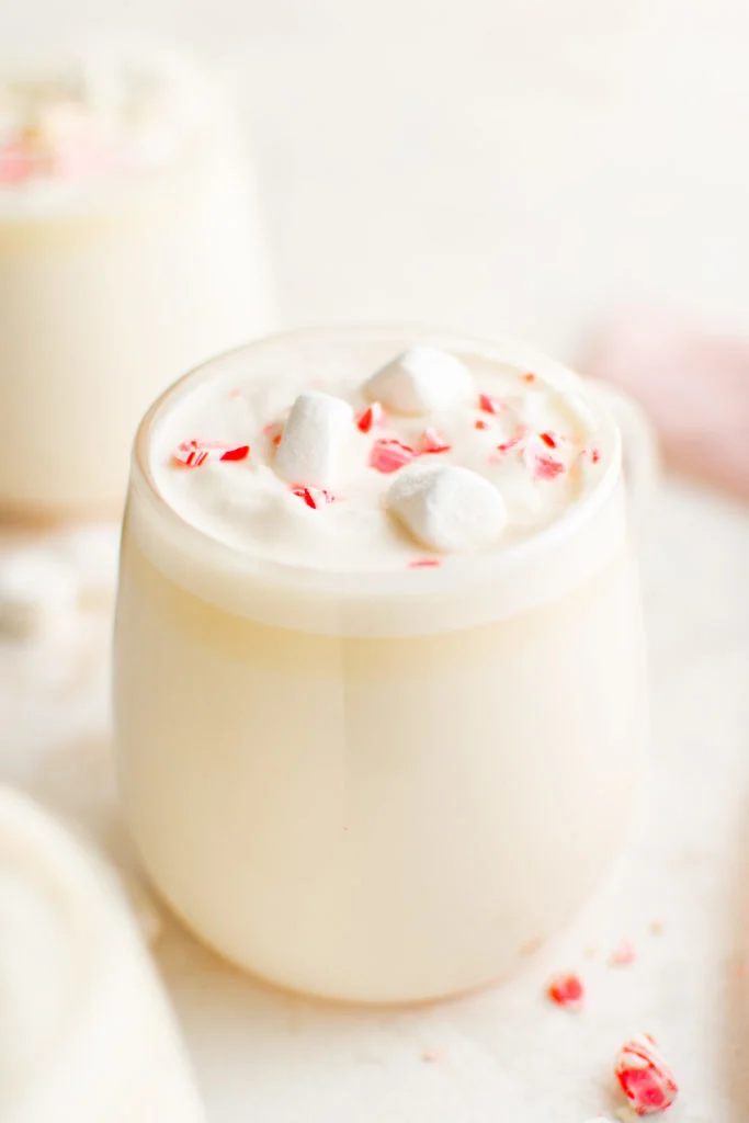 Side view of hot cocoa in a cup.