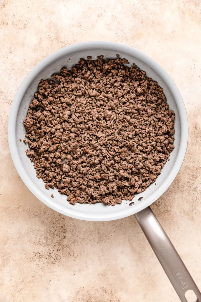 Ground beef in a pan.