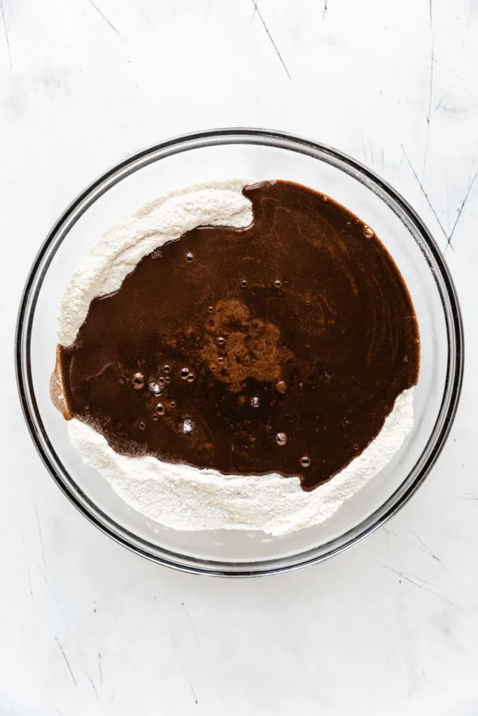 Melted chocolate poured over flour and sugar.