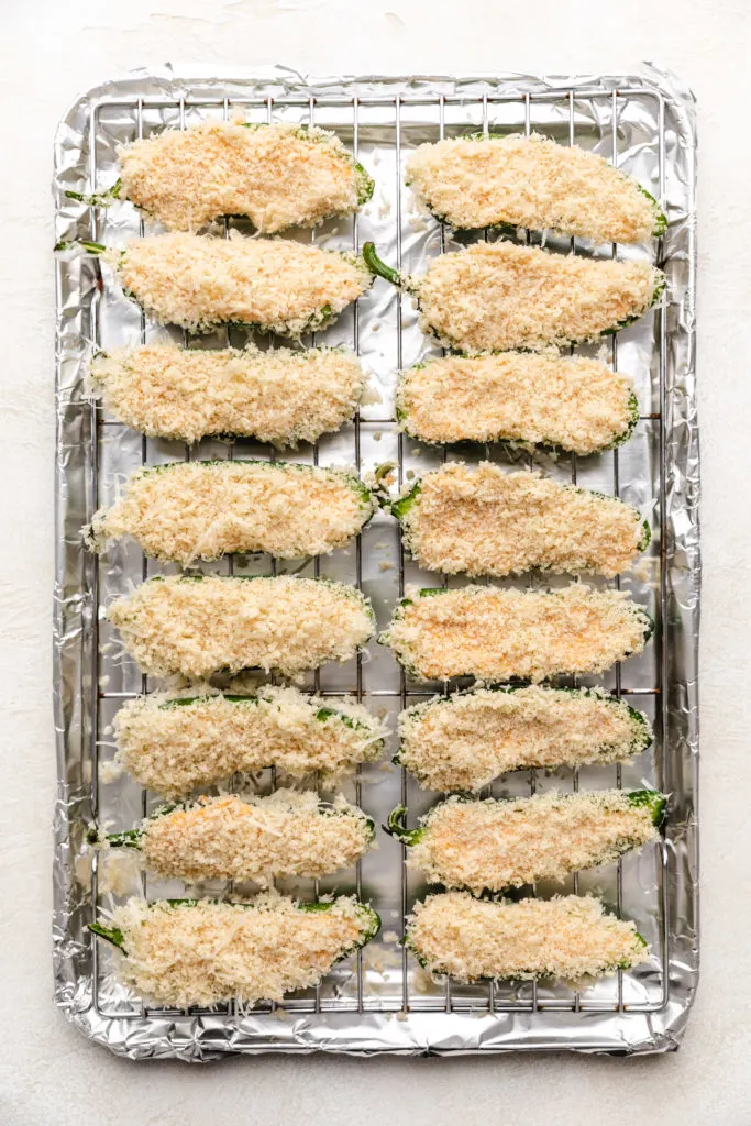 Breadcrumbs on a baking sheet.