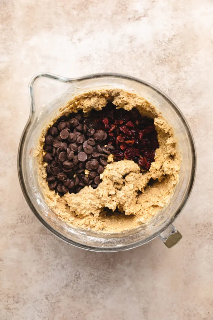 Dark chocolate chips and cranberries added to cookie dough.