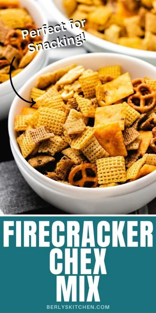 Close up view of a bowl of firecracker chex mix.