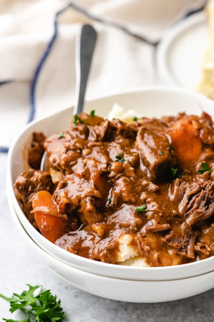 Big bowl of beef and guinness stew and potatoes.